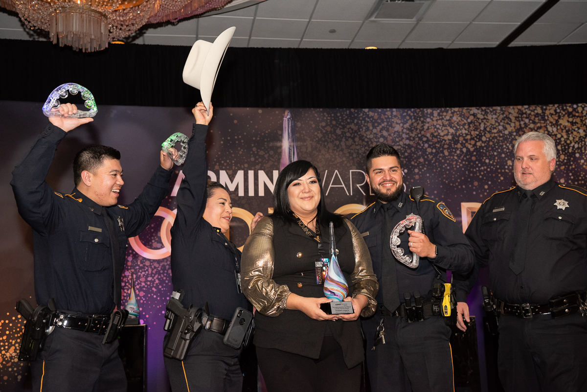 2024 Admin Awards Launch Event Houston Gulf Coast Region   Harris County Award Winner Team Shot Stage Excited Copy #keepProtocol